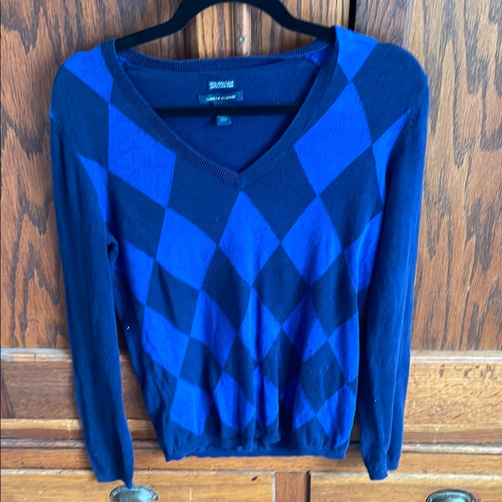 Tommy Hilfiger Blue Argyle V-Neck Sweater 

MEDIUM 
PREOWNED
VINTAGE